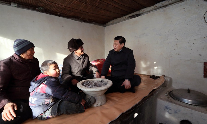 Xi Jinping visits impoverished villagers in Luotuowan Village of Longquanguan Township, Fuping County, north China's Hebei Province, Dec. 30, 2012.Photo:Xinhua