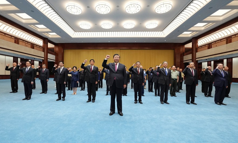 Xi Jinping leads other CPC and state leaders Li Keqiang, Li Zhanshu, Wang Yang, Wang Huning, Zhao Leji, Han Zheng and Wang Qishan to review the Party admission oath after visiting an exhibition on CPC history at the Museum of the CPC in Beijing, capital of China, June 18, 2021.Photo:Xinhua