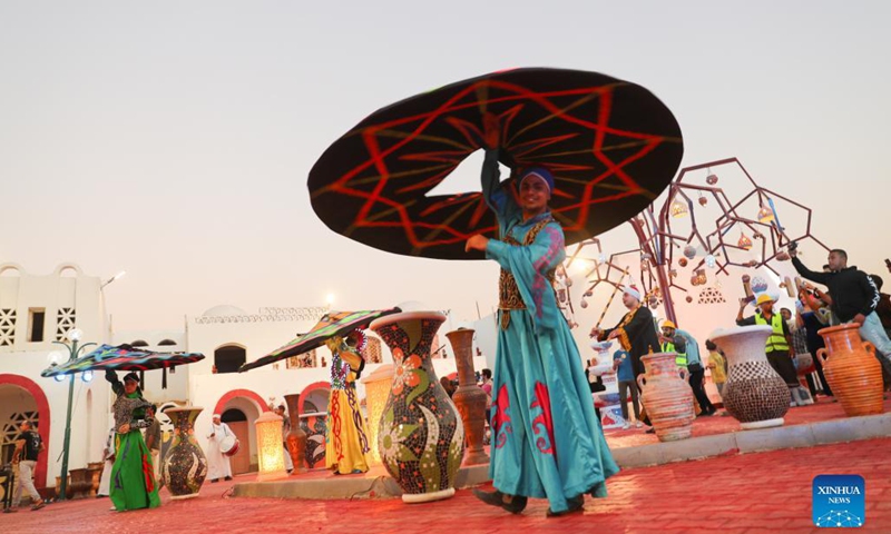 Artists perform during a pottery exhibition held at Fustat Pottery Village in Cairo, Egypt, Nov. 6, 2021. A two-day pottery exhibition opened on Saturday at the Fustat Pottery Village, with the aim of publicizing traditional Egyptian pottery cultures and reviving pottery industry.Photo: Xinhua