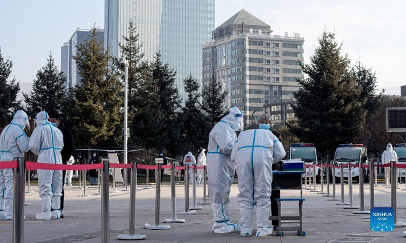 Medical workers work at a testing site in Xining, northwest China's Qinghai Province, Nov. 8, 2021. Xining started its second round of mass nucleic acid testing at 9 a.m. on Monday. As of Nov. 7, Xining finished the first round of testing, and all swab samples from 1,448,000 citizens came back negative. (Xinhua/Wu Gang)