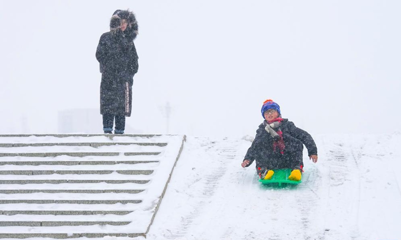 Citizens have fun in the snow in Changchun, northeast China's Jilin Province, Nov. 7, 2021.Photo:Xinhua