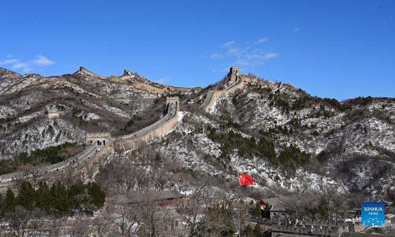This photo was taken on November 8 at the Great Wall at Badaling. From November 6-7, Beijing experienced significant snowfall. After snow, the Badaling section of the Great Wall looks particularly magnificent, winding into the distance amid the snow covered mountains. It is reminiscent of a scroll painting or postcard scene.(Photo: Xinhua)