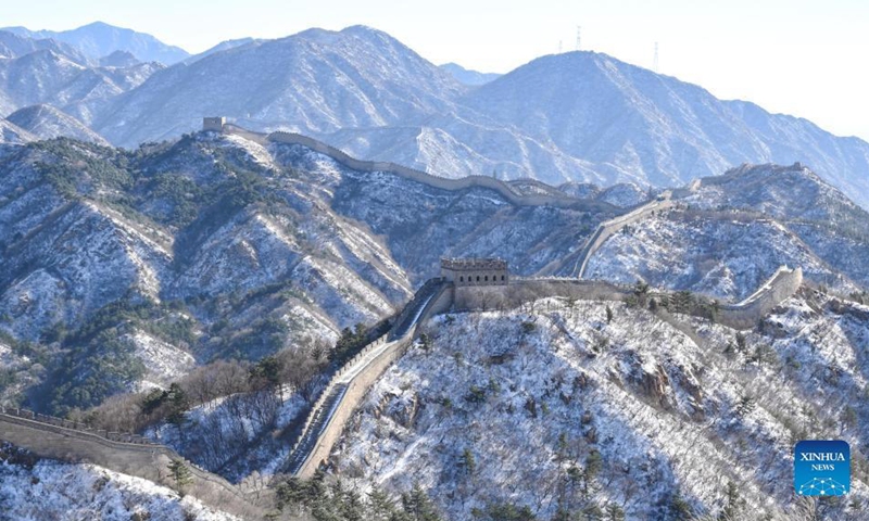 This photo was taken on November 8 at the Great Wall at Badaling. From November 6-7, Beijing experienced significant snowfall. After snow, the Badaling section of the Great Wall looks particularly magnificent, winding into the distance amid the snow covered mountains. It is reminiscent of a scroll painting or postcard scene.(Photo: Xinhua)
