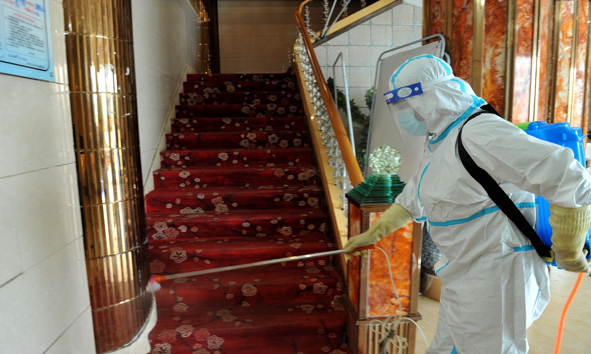 An enti-epidemic employee disinfects a hotel in Dexing, East China's Jiangxi Province on November 3. Photo: VCG