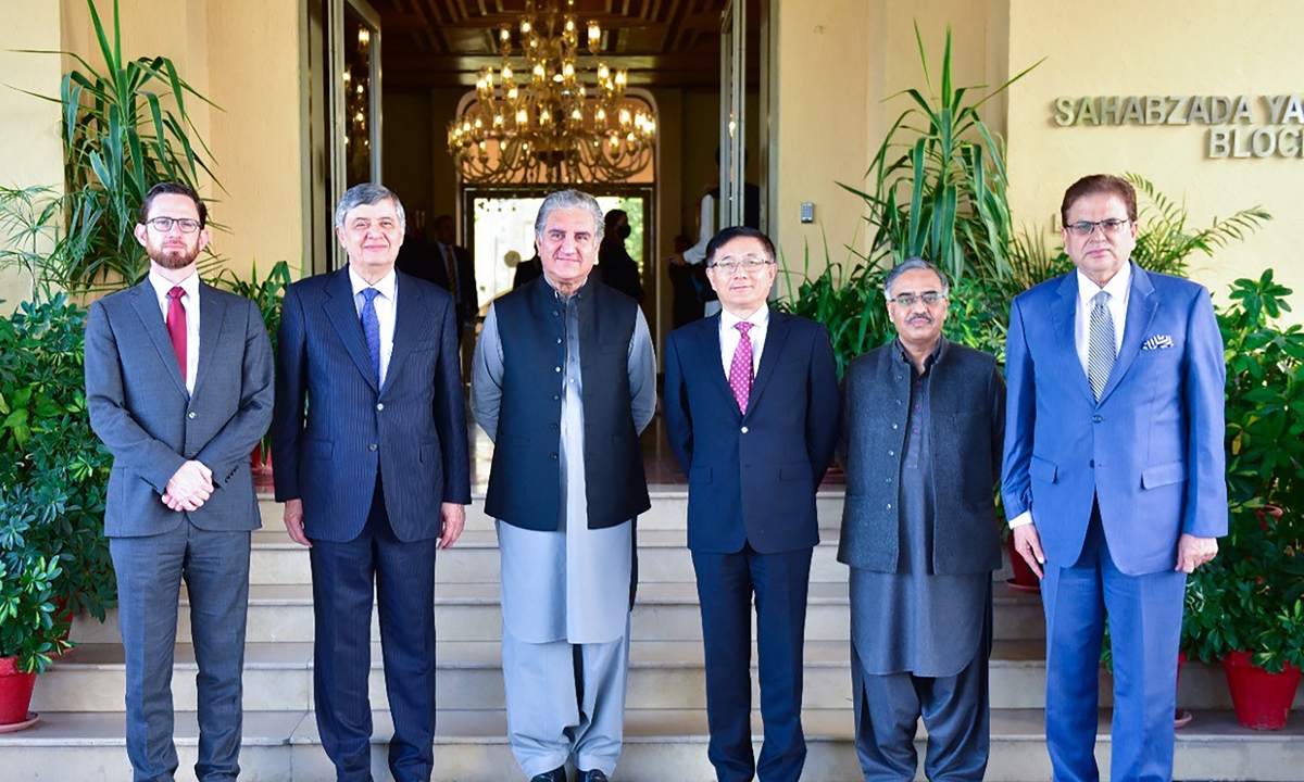 This handout photo taken and released by Pakistan's Ministry of Foreign Affairs on November 11, 2021 shows Pakistan's Foreign Minister Shah Mahmood Qureshi (3L) posing along with Pakistan's secretary foreign affairs, Sohail Mahmood (2R), US special representative for Afghanistan, Thomas West (L), Russian presidential envoy to Afghanistan, Zamir Kabulov (2L) and China's special envoy to Afghanistan Yue Xiaoyong (3R) prior to attend the 'Troika Plus' meeting on Afghanistan, in Islamabad. Photo: AFP