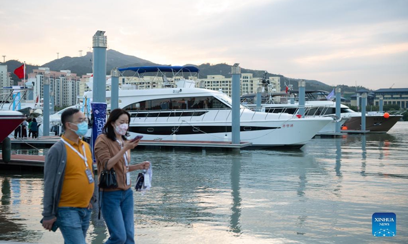 People visit the 11th China (Macao) International Yacht Import and Export Fair held in Macao, south China, Nov. 11, 2021. The yacht fair kicked off here on Thursday.Photo:Xinhua