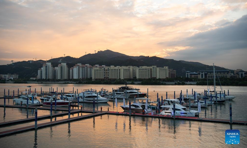 People visit the 11th China (Macao) International Yacht Import and Export Fair held in Macao, south China, Nov. 11, 2021. The yacht fair kicked off here on Thursday.Photo:Xinhua