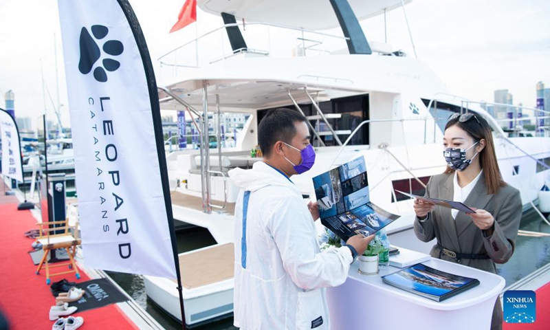 People visit the 11th China (Macao) International Yacht Import and Export Fair held in Macao, south China, Nov. 11, 2021. The yacht fair kicked off here on Thursday.Photo:Xinhua