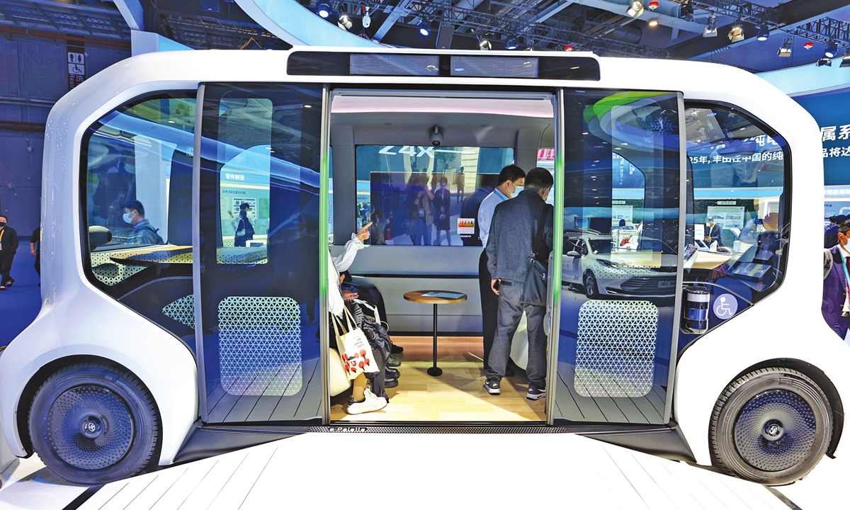 A driverless new-energy car serving the Winter Olympic Games are showed at the China International Import Expo on November 6, 2021. Photo: VCG