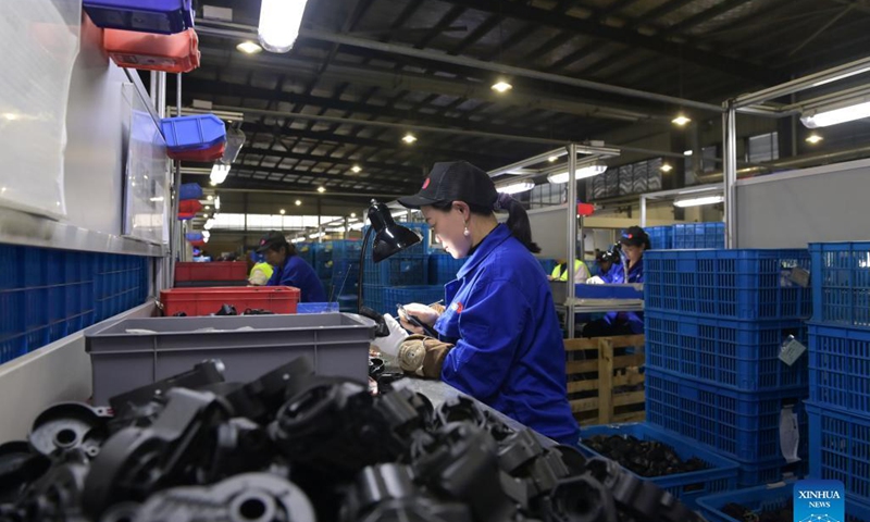 Employees work at an auto parts manufacturer in Chuzhou, east China's Anhui Province, Nov. 6, 2021. Chuzhou has been actively supporting the restructuring and upgrading of the city's auto parts sector, one of its pillar industries. Photo: Xinhua
