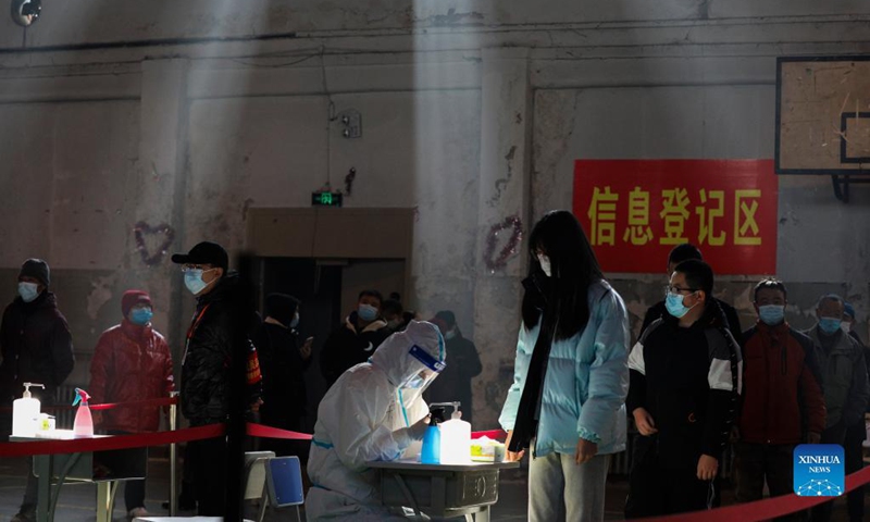 A medical worker registers information for a resident at a nucleic acid testing site in Xiangfang District of Harbin, northeast China's Heilongjiang Province, Nov. 15, 2021. Photo: Xinhua