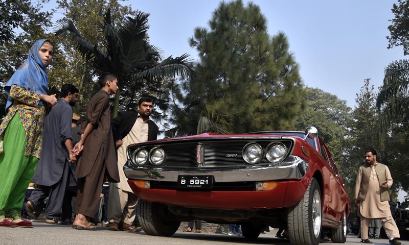 People visit the 12th Vintage and Classic Car Show in Peshawar, Pakistan, on Nov. 14, 2021.Photo:Xinhua