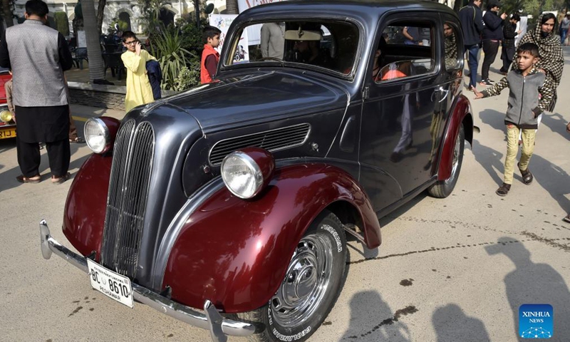 People visit the 12th Vintage and Classic Car Show in Peshawar, Pakistan, on Nov. 14, 2021.Photo:Xinhua