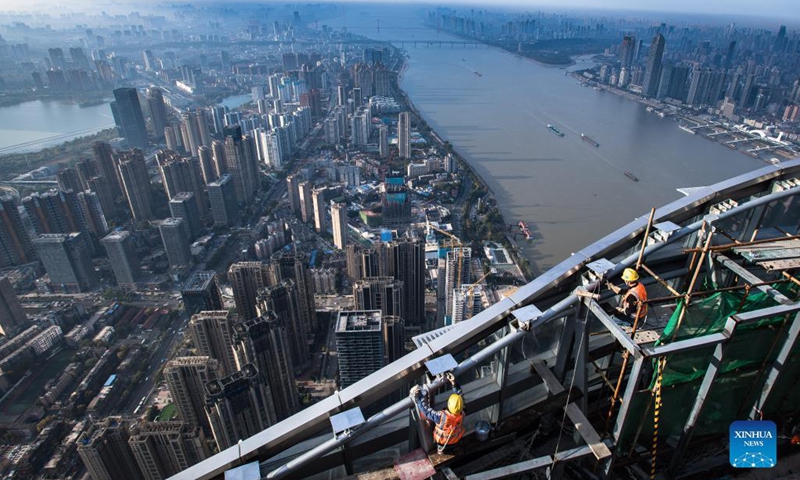 Photo taken on Nov. 15, 2021 shows the construction site of Greenland Center in Wuhan, central China's Hubei Province. Construction on Wuhan Greenland Center, a skyscraper project, has come to the final stage. Photo: Xinhua 