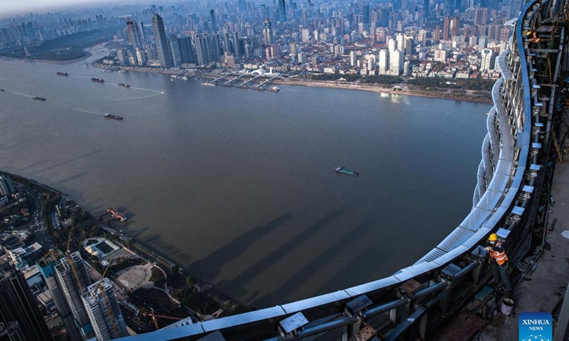 Photo taken on Nov. 15, 2021 shows the construction site of Greenland Center in Wuhan, central China's Hubei Province. Construction on Wuhan Greenland Center, a skyscraper project, has come to the final stage. Photo: Xinhua 