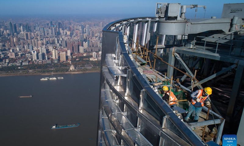 Photo taken on Nov. 15, 2021 shows the construction site of Greenland Center in Wuhan, central China's Hubei Province. Construction on Wuhan Greenland Center, a skyscraper project, has come to the final stage. Photo: Xinhua 