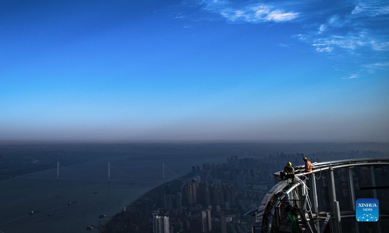 Photo taken on Nov. 15, 2021 shows the construction site of Greenland Center in Wuhan, central China's Hubei Province. Construction on Wuhan Greenland Center, a skyscraper project, has come to the final stage. Photo: Xinhua 