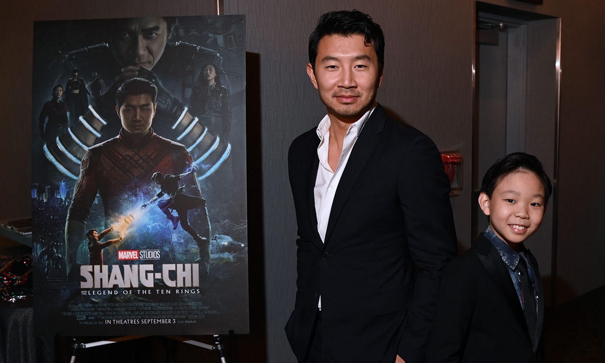 Simu Liu and Jayden Zhang, who respectively play the older and younger versions of Shang-Chi in <em>Shang-Chi and the Legend of the Ten Rings</em>, attend the premiere of the film. Photo: AFP