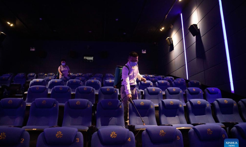 Staff members disinfect a cinema in Harbin, northeast China's Heilongjiang Province, Nov. 18, 2021. Harbin terminated its emergency responses to COVID-19 on Thursday and started advancing the full restoration of the normal economic and social order after the recent resurgence of COVID-19 has been subdued. Photo: Xinhua