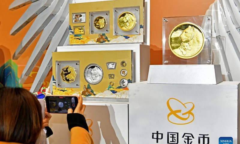 The commemorative coins to celebrate the Chinese zodiac Year of the Tiger are pictured in Beijing, capital of China, Nov. 18, 2021. Photo: Xinhua