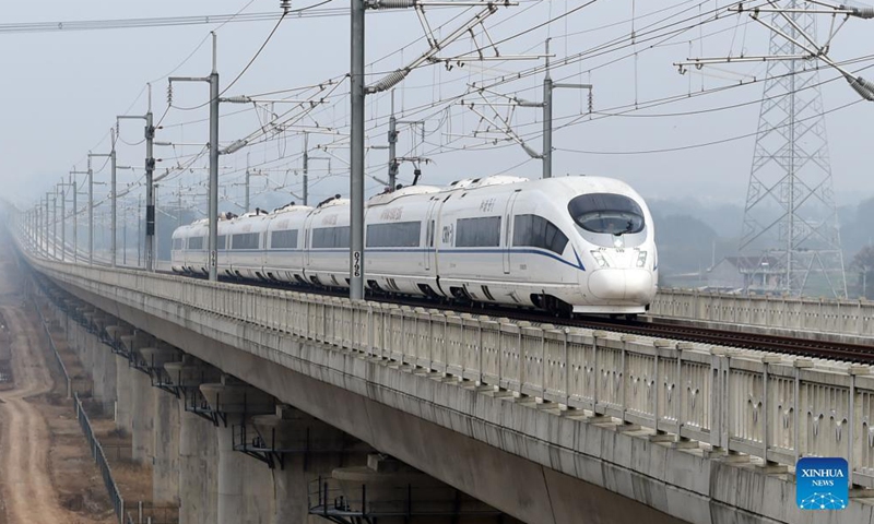 A train runs in the Anqing-Huangmei section of the Anqing-Jiujiang high-speed railway in Anqing, east China's Anhui Province, Nov 19, 2021. The trial operation of the Anqing-Huangmei section of the Anqing-Jiujiang high-speed railway began on Friday. Photo:Xinhua