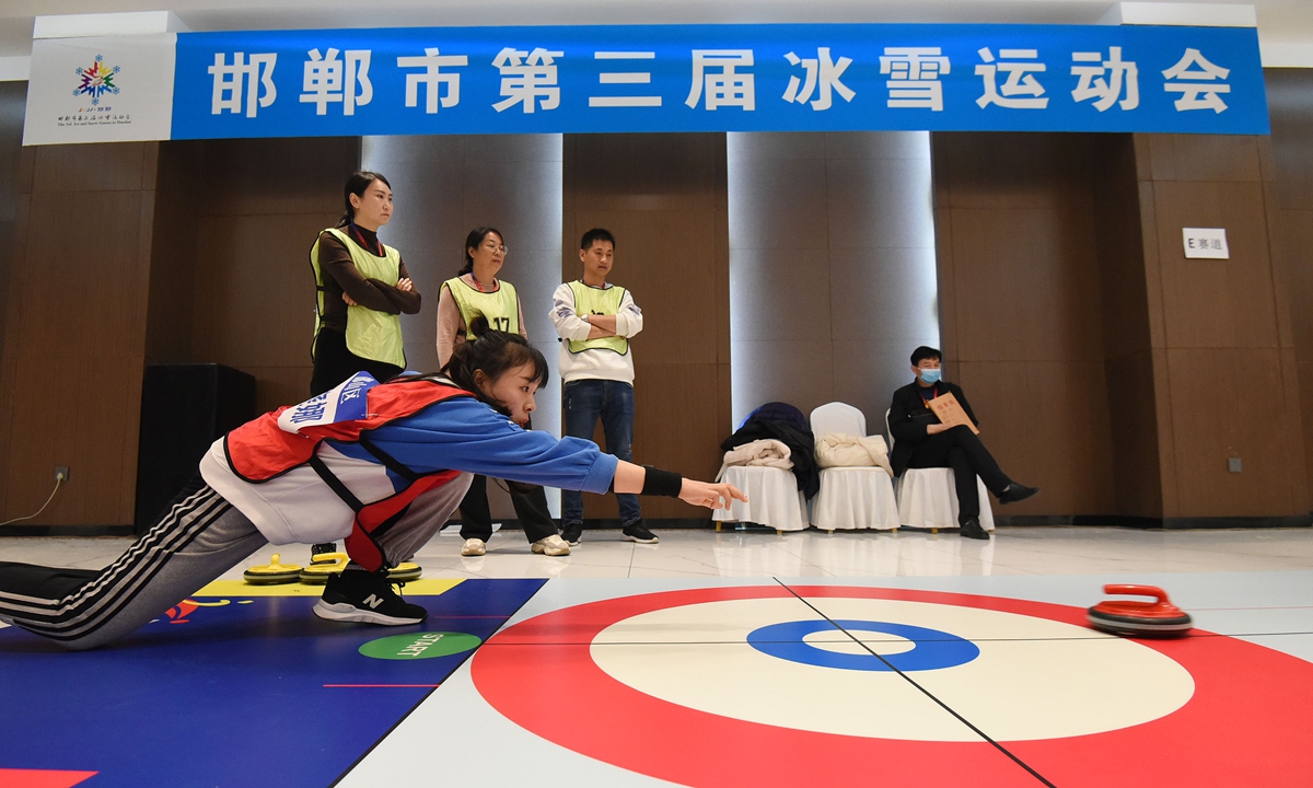 Athletes take part in a curling competition in the 3rd Ice and Snow Games in Handan, North China's Hebei Province, on November 21, 2021. Photo: VCG