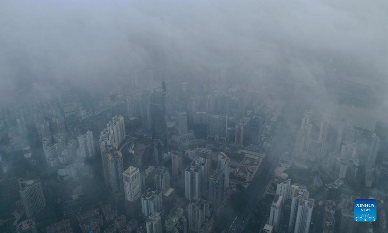 Aerial photo taken on Nov. 21, 2021 shows a city view in rain and mist in Nanning, south China's Guangxi Zhuang Autonomous Region.Photo: Xinhua