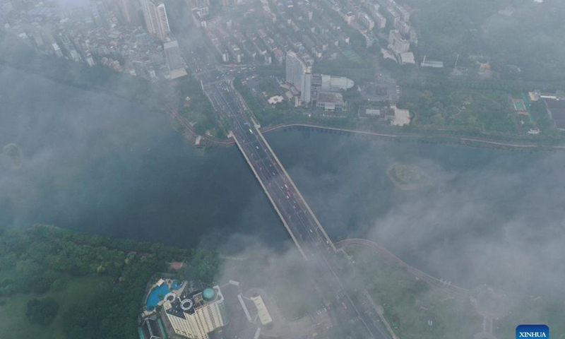 Aerial photo taken on Nov. 21, 2021 shows a city view in rain and mist in Nanning, south China's Guangxi Zhuang Autonomous Region.Photo: Xinhua