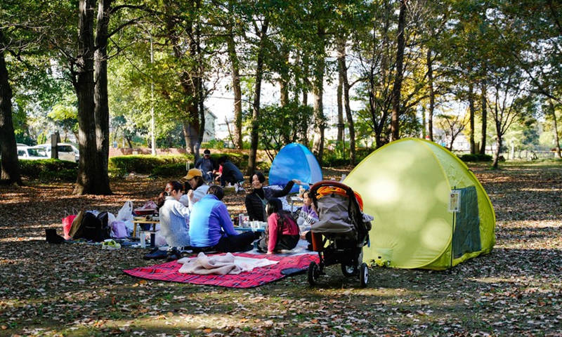 People enjoy themselves during Japan's Labor Thanksgiving Day holiday at Chikozen Park in Saitama, Japan, Nov. 23, 2021.Photo:Xinhua