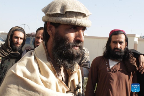 Islamic State (IS)-affiliated militants attend a surrender ceremony in Jalalabad, capital of Nangarhar province, Afghanistan, Nov. 23, 2021.Photo:Xinhua