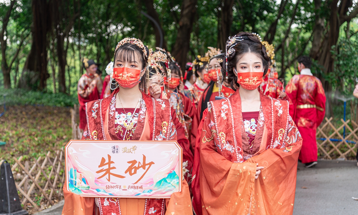 Girls wearing traditional Chinese garment hanfu gather at a park in Guangzhou, South China's Guangdong Province, to attend a local hanfu festival as Chinese find growing passion for their traditional culture and draw inspirations to create Chinese-style fashions. Photo: IC