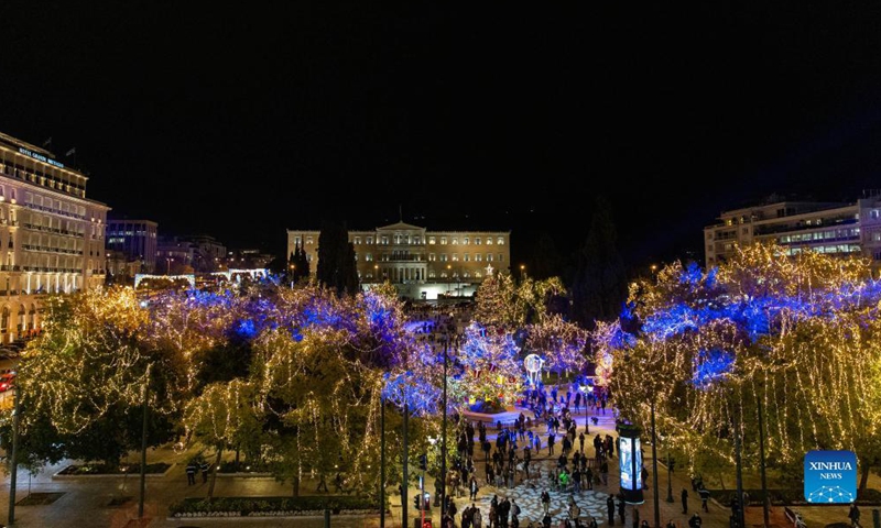 Illuminated trees with decorative lights are seen in Syntagma Square in Athens, Greece, on Nov. 23, 2021.Photo:Xinhua