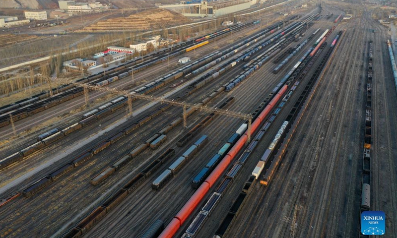 Aerial photo taken on Nov. 23, 2021 shows a view of the Baotou west station, where up to 30,000 tonnes of coal is loaded to trains every day, in north China's Inner Mongolia Autonomous Region.Photo:Xinhua