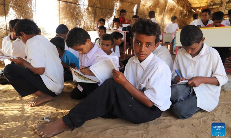 Students study inside a classroom made from straw at a primary school in Hajjah province, northern Yemen, Nov. 24, 2021.Photo:Xinhua