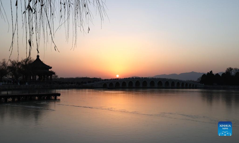 Photo taken on Nov. 25, 2021 shows the sunset scenery of the Summer Palace in Beijing, capital of China. Photo: Xinhua