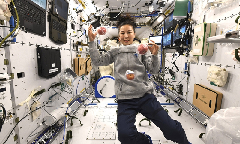 Photo provided by the Astronaut Center of China shows Chinese female taikonaut Wang Yaping in the space station core module Tianhe.(Photo; Xinhua)