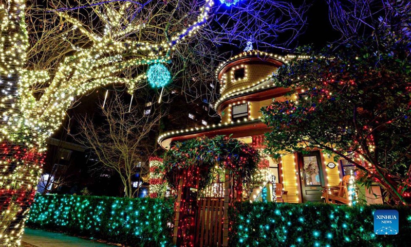 he Rand House, a heritage building, is illuminated with Christmas decorations in Vancouver, Canada, Nov. 26, 2021.Photo:Xinhua