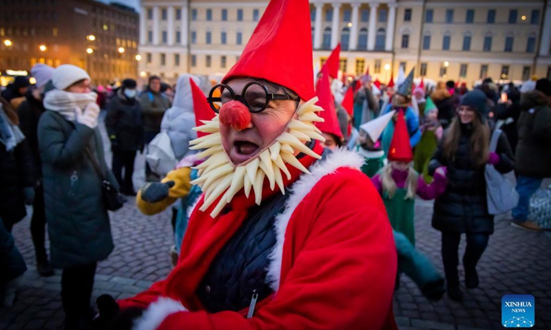 A performer is seen during a traditional Christmas opening event in Helsinki, Finland, on Nov. 27, 2021.Photo:Xinhua