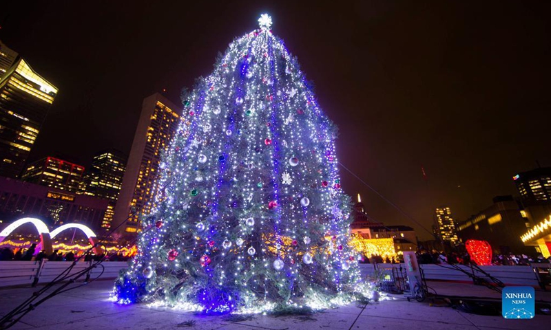 A Christmas tree with lights and decorations is on display during the 2021 Cavalcade of Lights in Toronto, Canada, Nov. 27, 2021.Photo:Xinhua