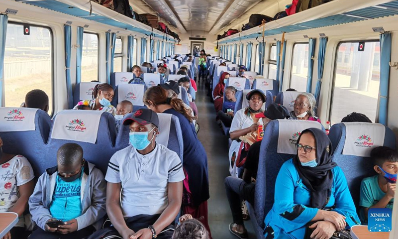 Passengers are seen on the train to Mombasa at Nairobi station of Mombasa-Nairobi Standard Gauge Railway (SGR) in Nairobi, capital of Kenya, Nov. 22, 2021.Photo:Xinhua