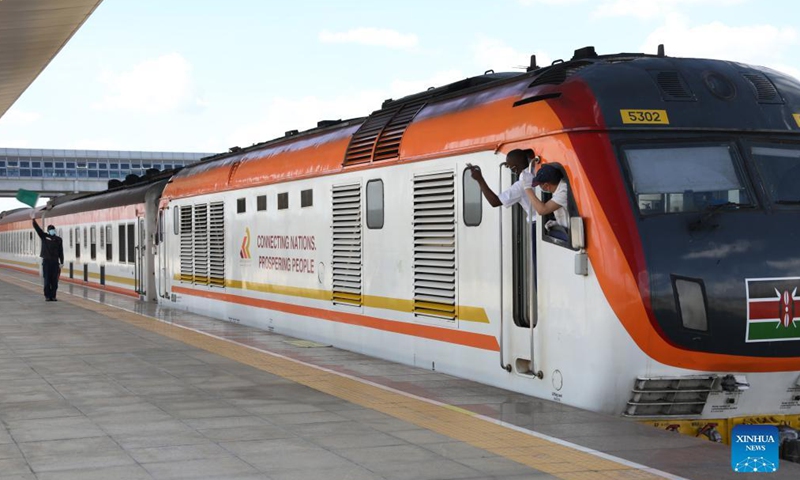 Chinese and Kenyan drivers prepare to launch the train at Nairobi station of Mombasa-Nairobi Standard Gauge Railway (SGR) in Nairobi, capital of Kenya, Nov. 17, 2021.Photo:Xinhua