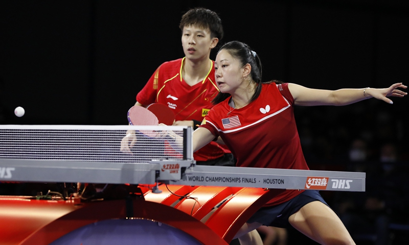 Lin Gaoyuan (left) from China and Lily Zhang from the US attend the 2021 World Table Tennis Championships Finals in Houston, the US on November 29, 2021. Photo: VCG