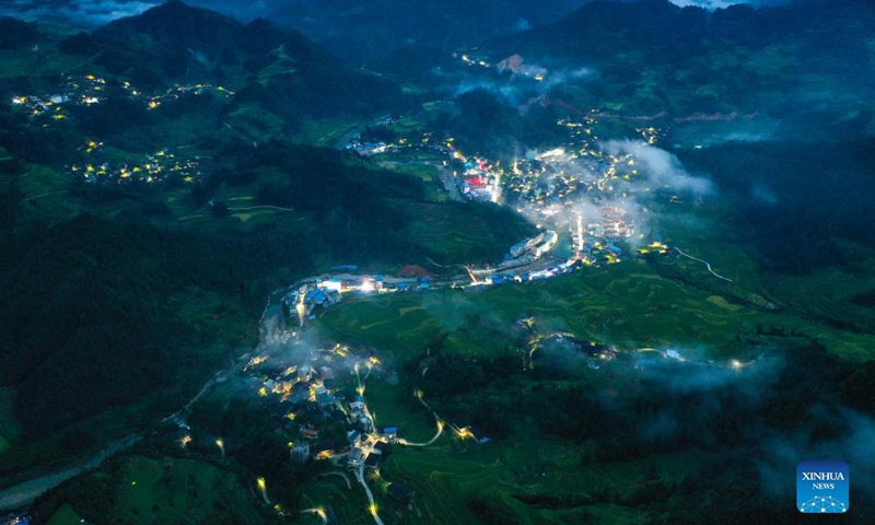 Aerial photo taken on Aug. 27, 2021 shows the night view of Gandong Village in Gandong Township of Rongshui Miao Autonomous County, south China's Guangxi Zhuang Autonomous Region.Photo:Xinhua