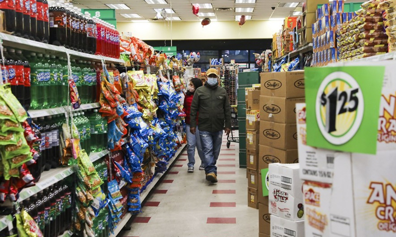 Customers shop at a Dollar Tree store in New York, the United States, Nov. 26, 2021.Photo:Xinhua