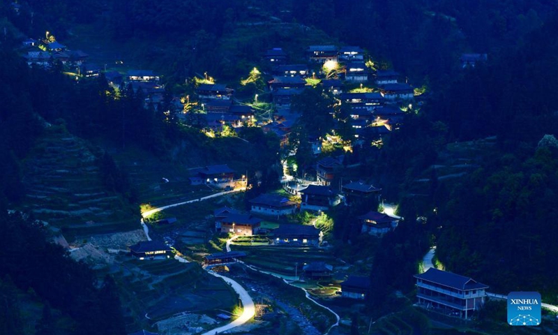 Photo taken on May 14, 2021 shows the night view of Dangjiu Village in Gandong Township of Rongshui Miao Autonomous County, south China's Guangxi Zhuang Autonomous Region.Photo:Xinhua