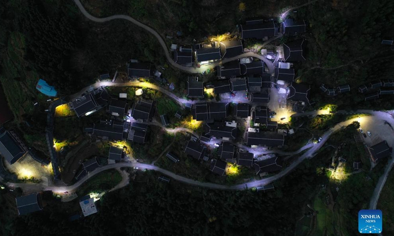 Aerial photo taken on Nov. 27, 2021 shows the night view of Rongdi Village in Sirong Township of Rongshui Miao Autonomous County, south China's Guangxi Zhuang Autonomous Region.Photo:Xinhua