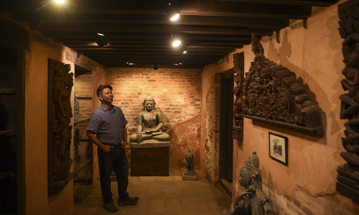 Heritage expert Rabindra Puri stands during an interview with AFP at his house in Bhaktapur, Nepal on June 23, 2021. Photo: AFP