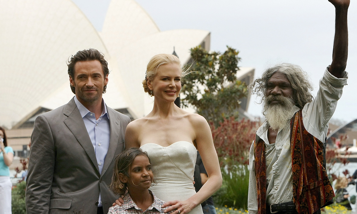 Actress Nicole Kidman (center), actor Hugh Jackman (left) and actor David Gulpilil pose with co-star Brandon Walters (below) for a photo following a press conference prior to the world premier for the movie Australia in Sydney on November 18, 2008. 
Photo: AFP