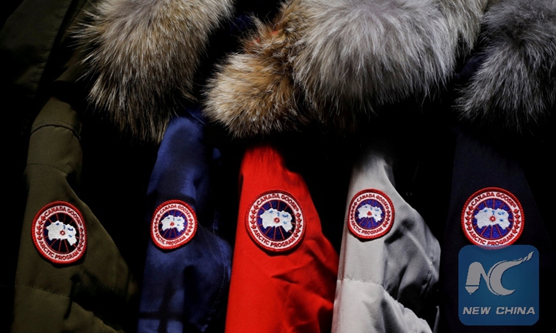 Jackets hang in the showroom of the Canada Goose factory in Toronto, Ontario, Canada, February 23, 2018.Photo:Xinhua
