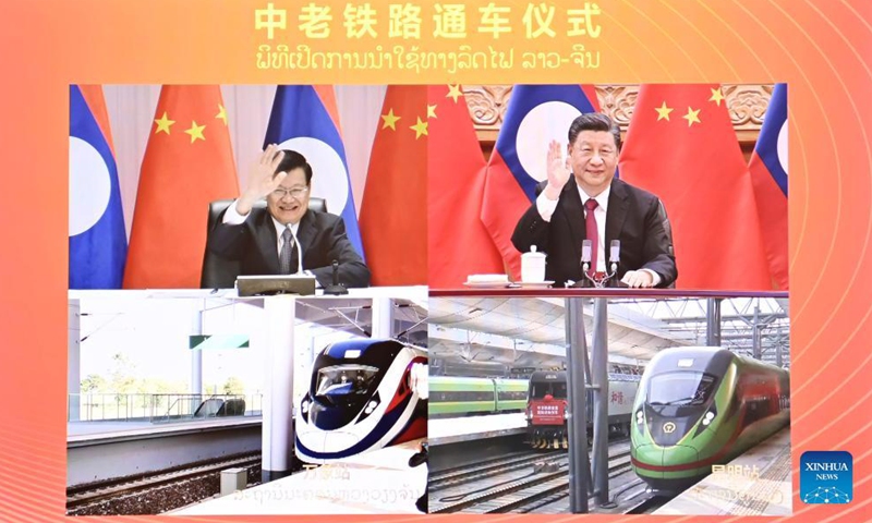 Xi Jinping, general secretary of the Communist Party of China Central Committee and Chinese president, and Thongloun Sisoulith, general secretary of the Lao People's Revolutionary Party Central Committee and Lao president, jointly witness the opening of the China-Laos railway via video link, Dec. 3, 2021.Photo:Xinhua